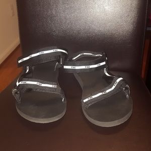 Stylish black sandals worn once